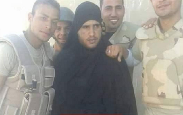 qadin-paltari-geyinmis-isid-ci-tutuldu