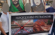 28-mallun-qarsisinda-plakat-acan-teriqet-uzvleri-hebs-edildi