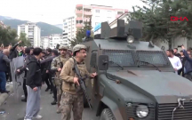 Hücumdan sonra cəsədi məktəbdən zirehli maşınla çıxarılıb