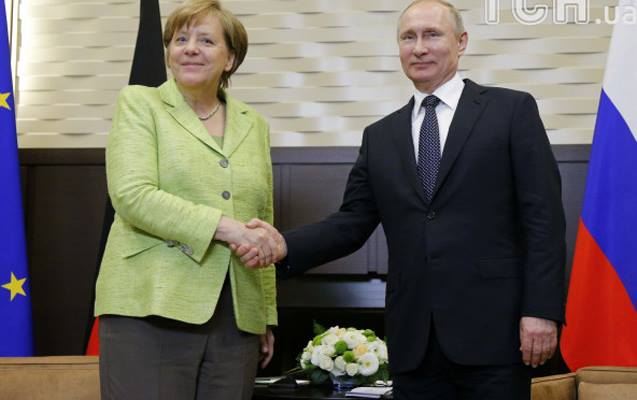 putin-merkelle-sanksiyalari-muzakire-etmeyib