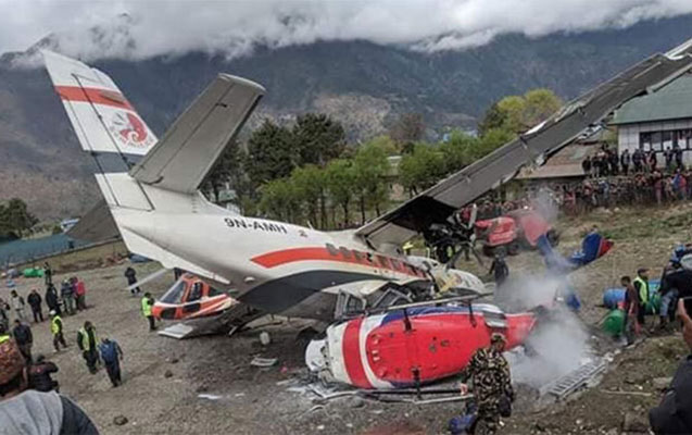 nepalda-teyyare-helikopterlerle-toqqusdu