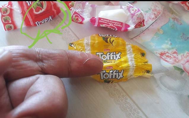 usaq-ucun-konfet-aldi-icinden-demir-parcasi-cixdi