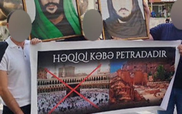 28-mallun-qarsisinda-plakat-acan-teriqet-uzvleri-hebs-edildi