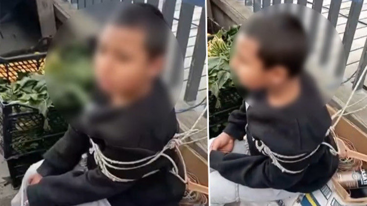 ogurluq-etdiyi-deyilen-9-yasli-usagi-iple-baglayib