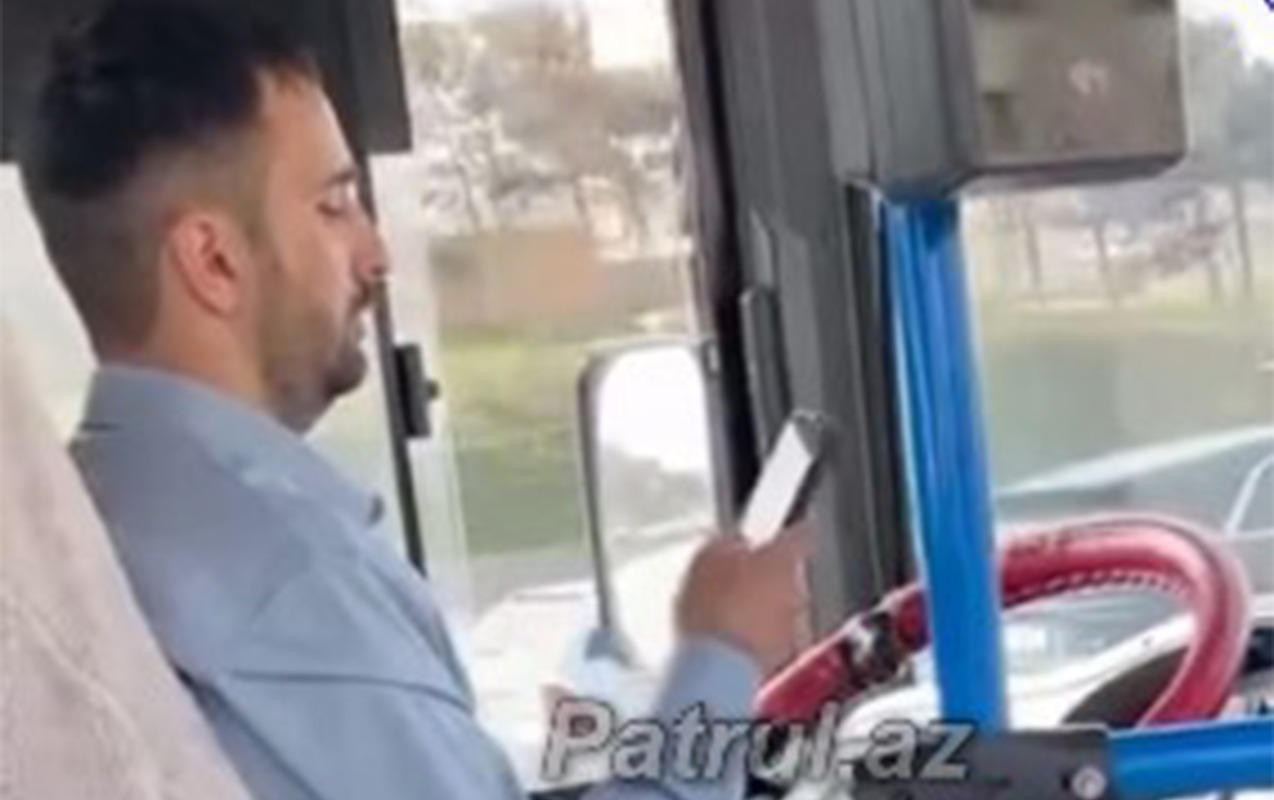 sukan-arxasinda-telefondan-istifade-eden-surucuye-tohmet-verildi