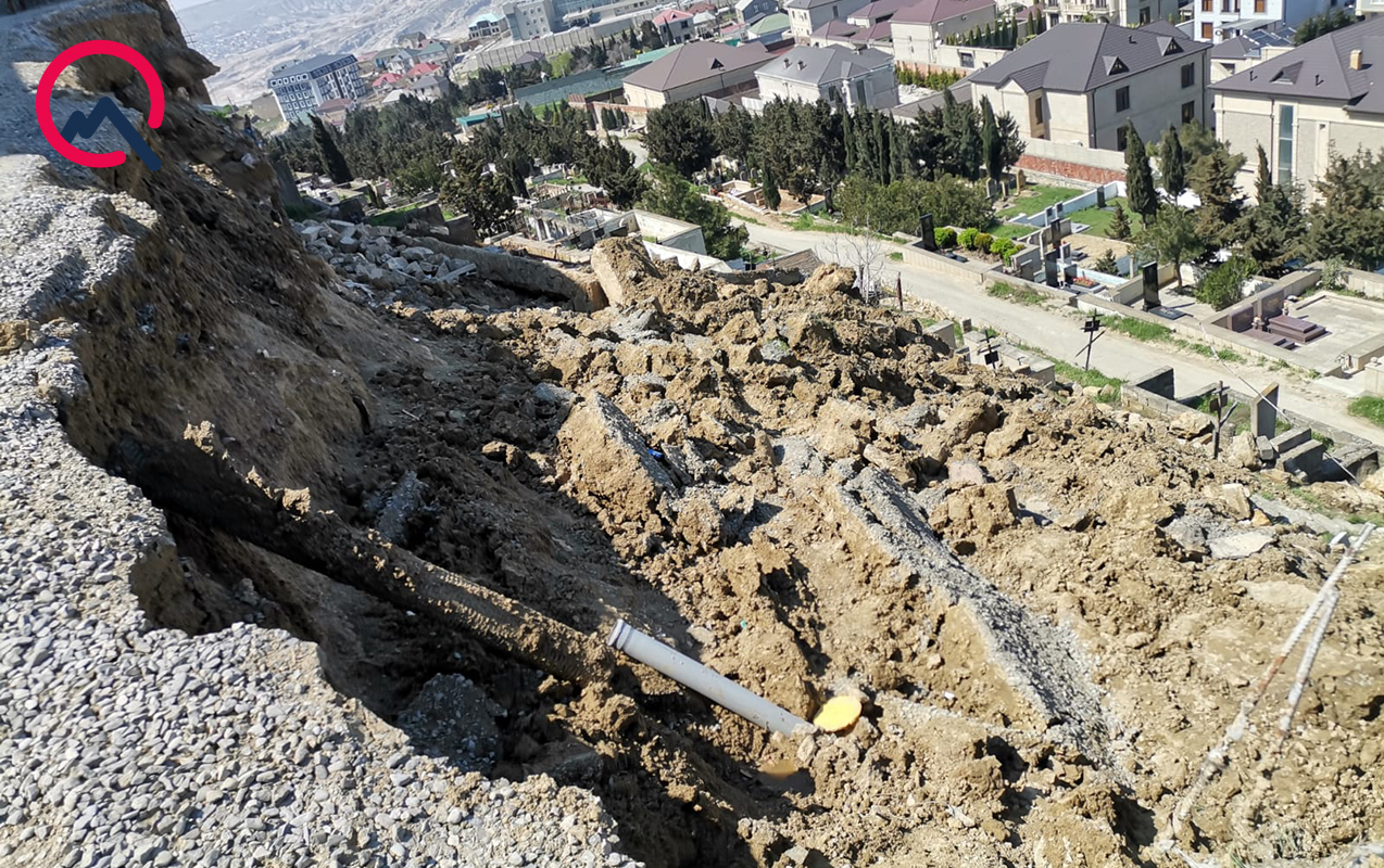 badamdarda-qebiristanliga-dusen-yolda-surusme