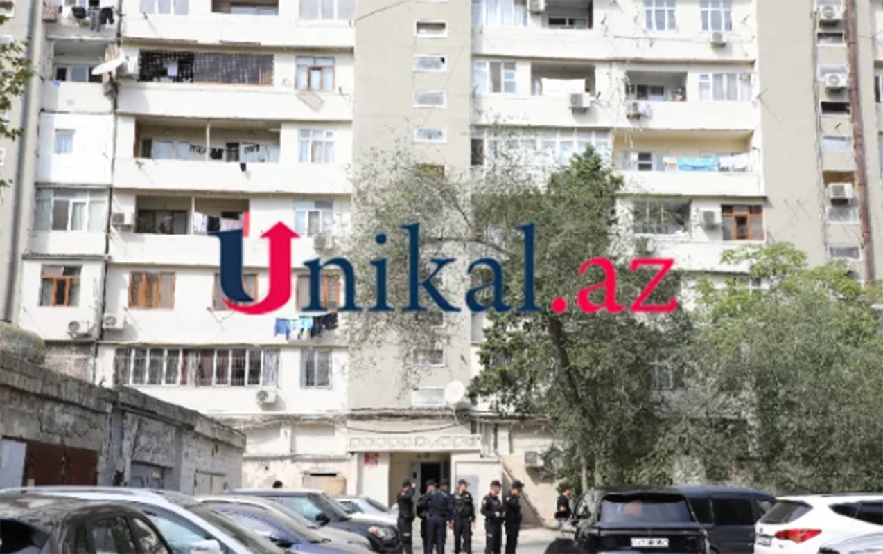 bakida-oglunu-olduren-qadin-ozunu-binadan-atdi